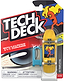 A Tech Deck 96mm M61 Fingerboard - Toy Machine Ed Templeton in its packaging, featuring a yellow deck with an orange monster graphic and a blue plastic assembly tool.