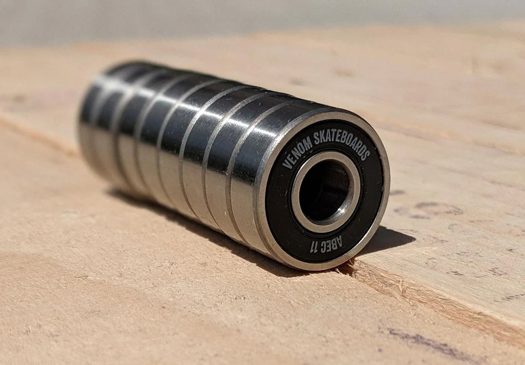 A pack of eight Venom ABEC 11 Skateboard Bearings with black seals.