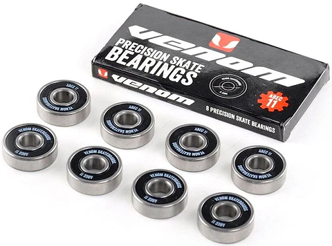 Eight Venom ABEC 11 Skateboard Bearings with black rings and silver centers, shown alongside their black and white product box.