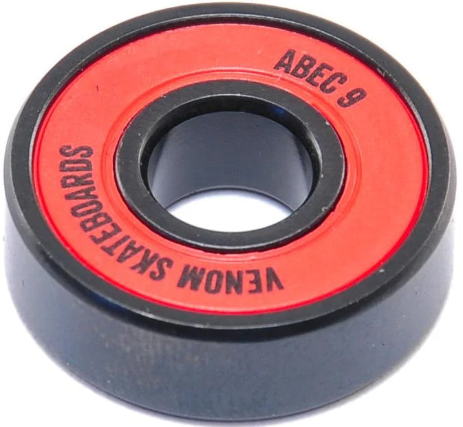 A black and red Venom ABEC 9 Skateboard Bearings with “ABEC 9” and “VENOM SKATEBOARDS” printed on the red surface.