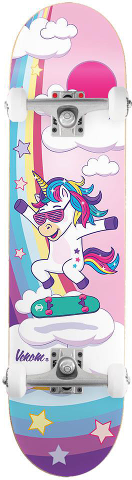 A Venom Junior Unicorn Flip Kids Complete Skateboard - 7.25″ x 29″ featuring a cartoon unicorn wearing sunglasses and riding a small skateboard against a background of clouds, a rainbow, and a pink sun.