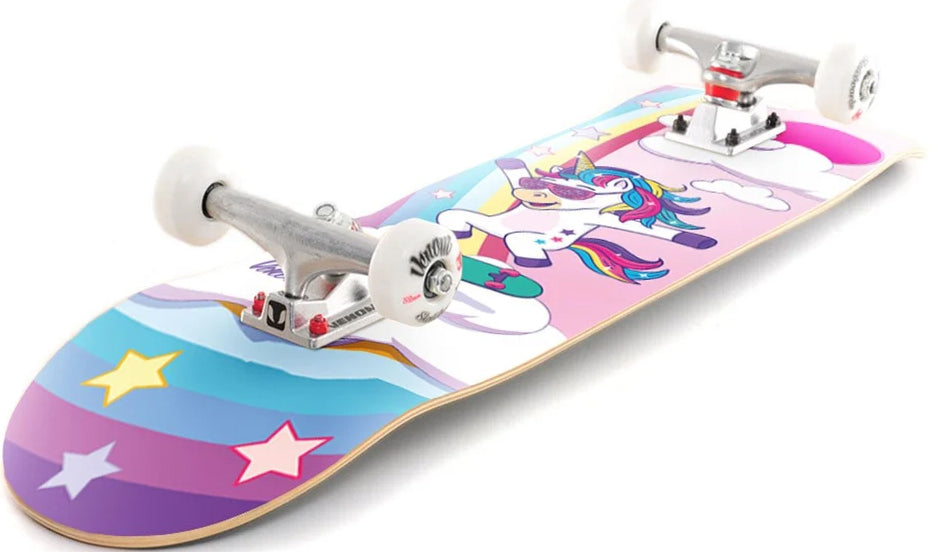 A Venom Junior Unicorn Flip Kids Complete Skateboard - 7.25″ x 29″ featuring a colorful graphic of a unicorn wearing sunglasses on a rainbow and cloud background.