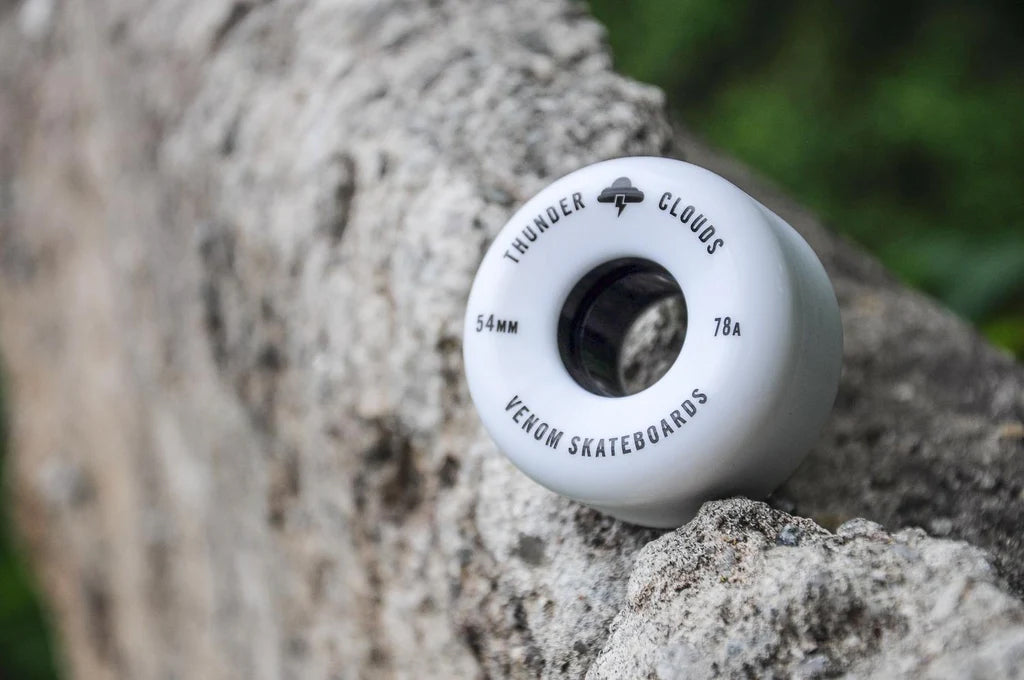Venom Thunder Clouds V2 60mm 78A Skateboard Wheels in white, featuring black text and a cloud icon printed on the side.