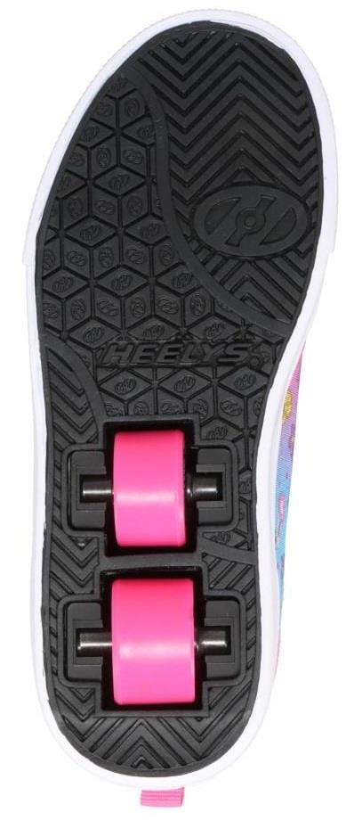 The image shows the bottom of Heelys Pro 20 X2 Girls Shoes - Pink / Cyan by Heelys, featuring two bright pink wheels with ABEC 5 bearings set in a black rubber sole with a geometric tread pattern and a logo near the heel.