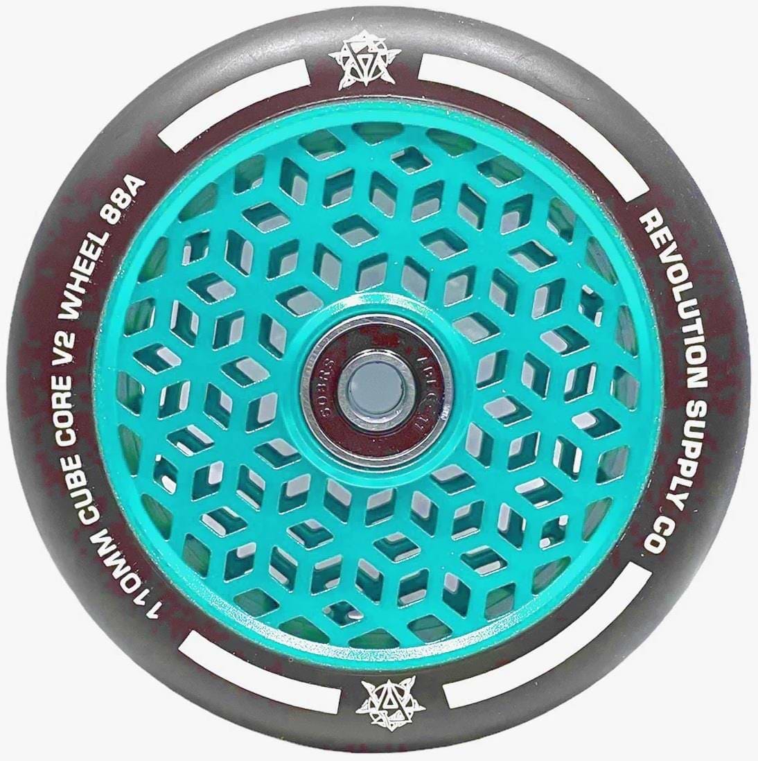 The Revolution Cubed Core Ultralite 110mm Stunt Scooter Wheel in aqua blue features a geometric honeycomb core, silver accents, black rim, white "110MM CUBE CORE V2 WHEEL 88A" text, and "REVOLUTION SUPPLY CO" branding around the edge.