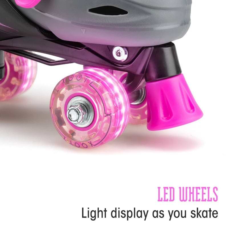 Close-up of Xootz LED Adjustable Quad Roller Skates - Pink, featuring glowing pink LED wheels. The text reads "LED WHEELS" and "Light display as you skate." Ideal for kids or beginners wanting to stand out in style. Brand: Xootz.