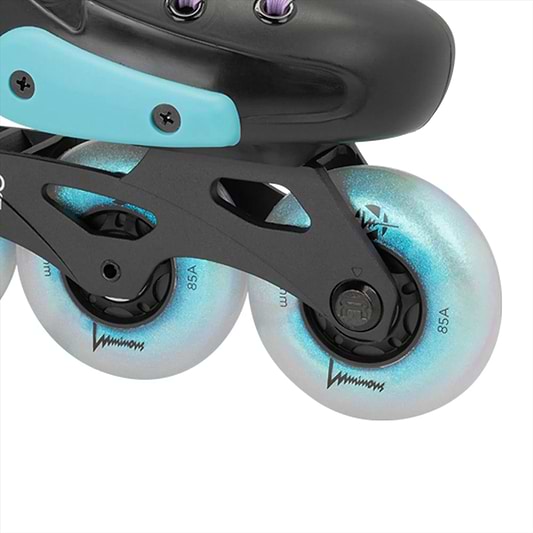 A close-up of an FR Skates Junior Adjustable Inline Skate in Luminous Black Pearl, featuring three FR Street King white wheels with a blue metallic sheen labeled "85A." The X-Series frame showcases angular cutouts.