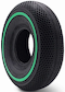 The Wildcat Original Pro 10" Mini BMX Tyre by Wildcat features a solid black design with a green sidewall strip and honeycomb pattern, offering durability and shock absorption for scooters or Wildcat Pro Mini BMX bikes.