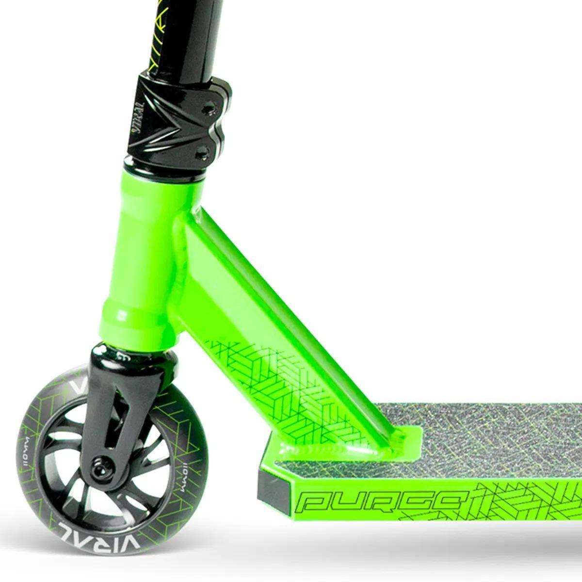 Close-up of the Madd Gear Viral Purge Complete Stunt Scooter - Jade, featuring the front wheel, fork, clamp, and part of the deck with geometric patterns and "PURGE" branding.