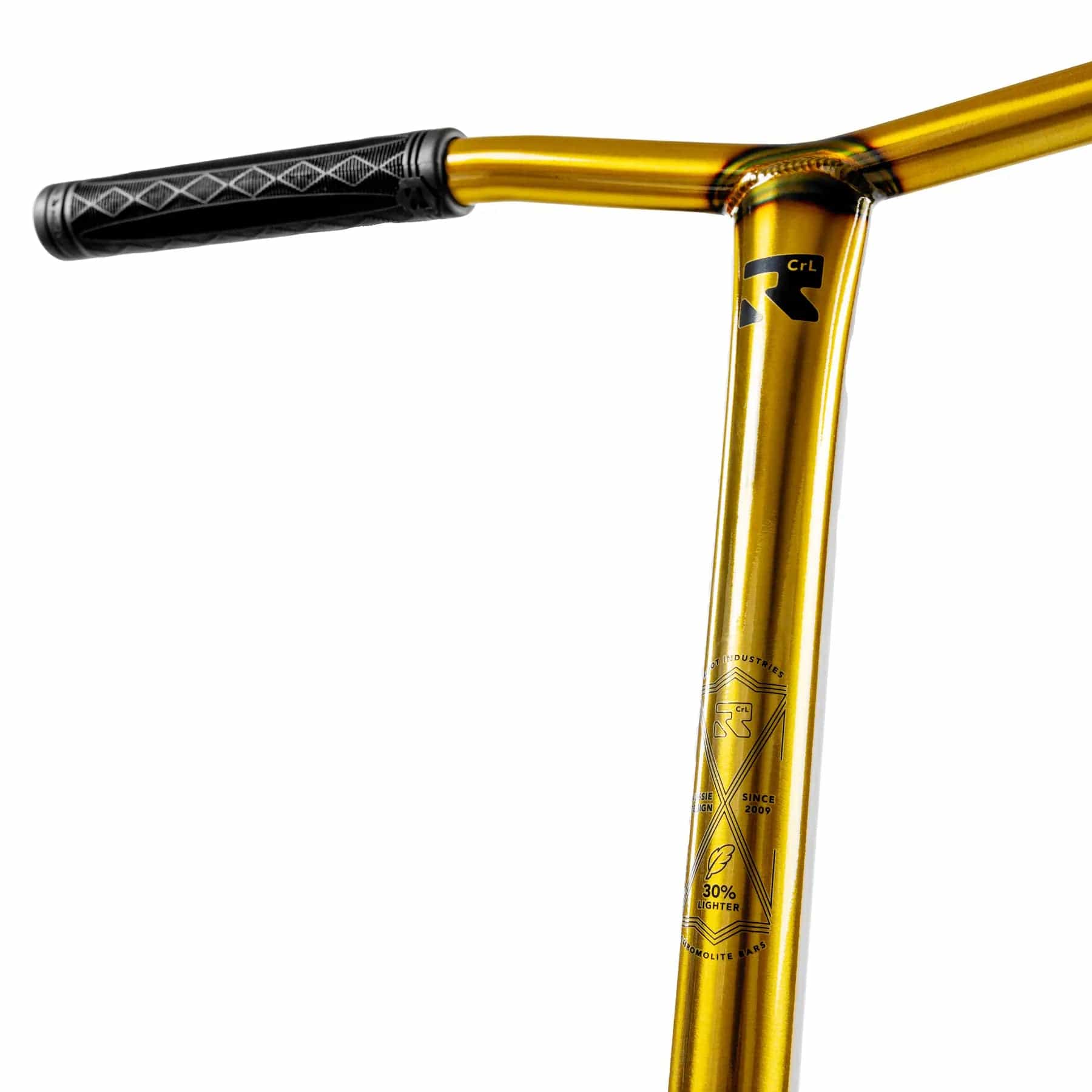 Close-up of the Root Industries Invictus V3 Complete Stunt Scooter handlebar in Burnt Gold, showing a black textured grip with geometric patterns and technical specs on the metal. The background is white.
