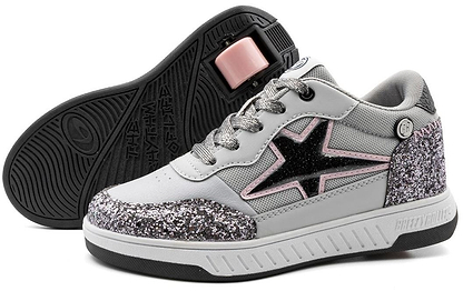 The Breezy Rollers Star Shoes - Silver / Grey feature a patented wheel system, silver glitter accents, gray laces, and a black star with a pink outline. One shoe is upright; the other displays the sole and black wheel.