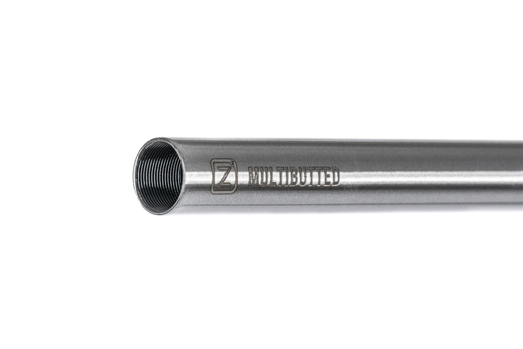 A close-up of Ethic DTC Tenacity V2 Steel Oversized HIC Stunt Scooter T-Bars (Raw, 620mm x 600mm) shows the metallic tube with internal threading at one end and "MULTICUTTED" plus the Ethic logo engraved on its side against a white background.