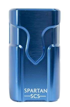 A shiny blue Supremacy Spartan SCS clamp boasting a sleek, smooth design and durable aluminium construction. It features "SPARTAN SCS" branding engraved on the lower front section. The polished surface ensures a secure fit while subtly reflecting light.
