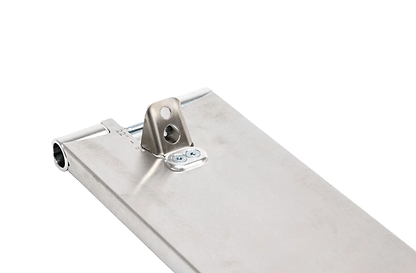 Close-up of the Apex Pro Raw Silver Boxed Stunt Scooter Deck, featuring a flat rectangular stainless steel surface with a sleek metal finish that reflects light. Attached is a small bracket equipped with two screws and a top hole for mounting. The scooter deck, measuring 6" x 22", is set against a plain white background.