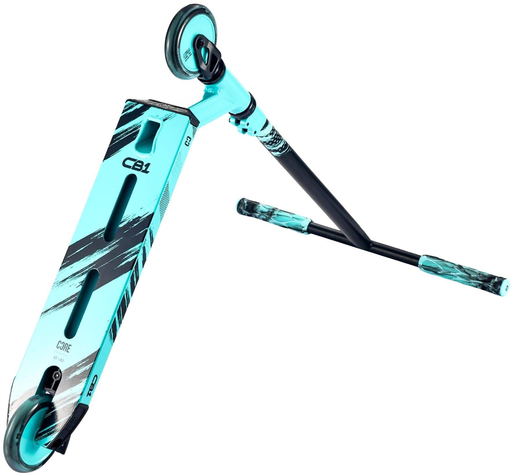 The CORE CB1 Beginner Complete Stunt Scooter by CORE in teal and black features a wide deck, two small wheels, and textured handlebars, shown at an angle highlighting the base, handlebar, and wheel details.