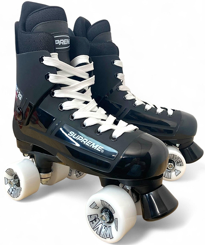A pair of Supreme Turbo 33 Nylon Quad Roller Skates in black with white wheels and toe stops, featuring black graphics on the wheels and white laces, set against a plain white background.