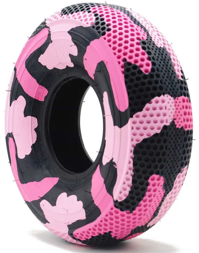 The Wildcat Original Pro 10" Mini BMX Tyre - Pink Camo by Wildcat features a textured, hollow center with a striking black, light pink, and hot pink camouflage pattern. Shown on a white background—ideal for upgrading your Mini BMX.