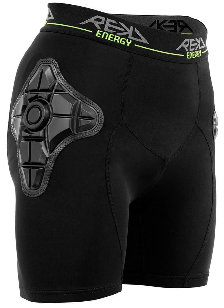REKD Energy Pro Impact Skate Protection Shorts in black feature a thick "REYDEL ENERGY" waistband, REKD Energy Foam, and a padded black left hip guard for multi-sport protection during physical activities.