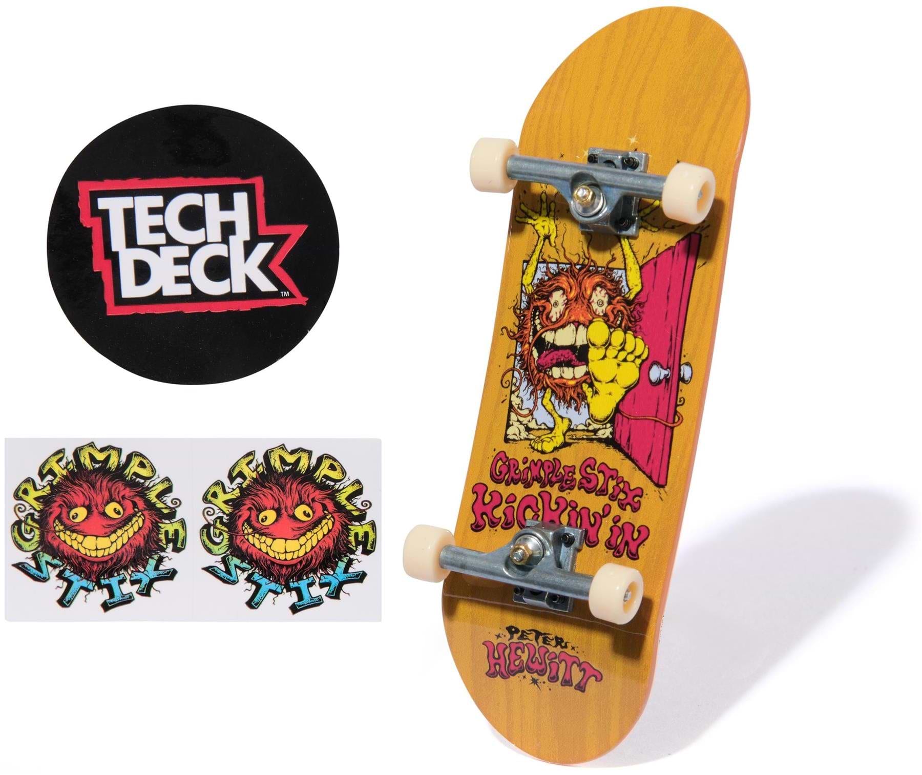 The Tech Deck 96mm M57 Fingerboard - Grimple Stix features a colorful monster graphic, white wheels, silver trucks, two Grimple Stix logo stickers, and a round black Tech Deck sticker—ideal for skateboard collectible fans.