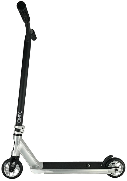 The Union Aero Complete Stunt Scooter by Union features a black handlebar, black grips, two small black and silver wheels, and a wide textured deck in black/raw. This lightweight stunt scooter is displayed on a white background.