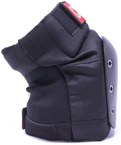 The CORE Combo Street Knee & Elbow Skate Protection Pad Set in black by CORE includes a black knee pad with a hard plastic shell, riveted details, and a red and white label on the strap, displayed upright against a white background.