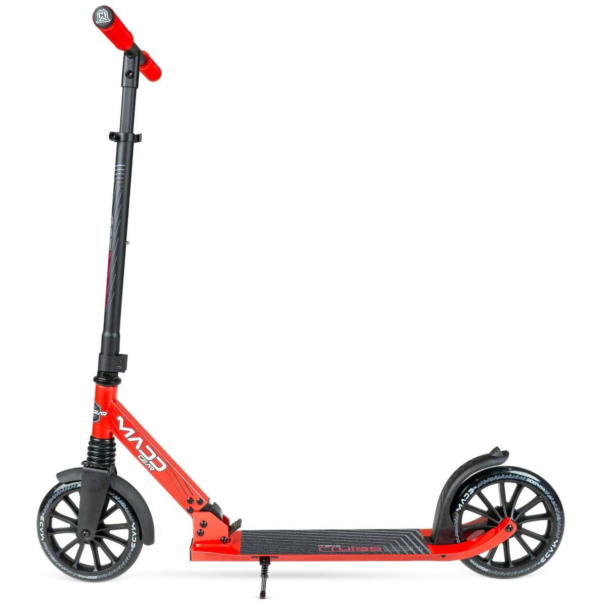 The Madd Gear Metro Cruise 250 Foldable Commuter Scooter in black/red features large wheels, an adjustable handlebar, rear foot brake, and kickstand—ideal for adult commuters. Side view shown on a white background.