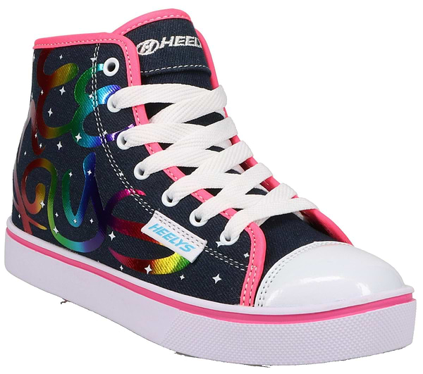 The Heelys Veloz Girls Shoes - Denim / Rainbow feature a dark blue Hi Top denim style with white laces, thick white sole, pink trim, rainbow graffiti, small white stars, low-profile wheels, and brand logos on the tongue and side.