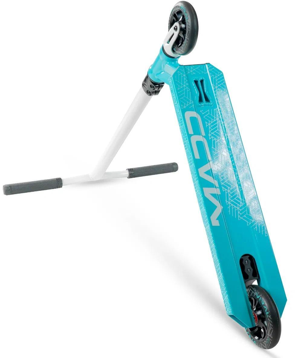 The Madd Gear Viral Purge Complete Stunt Scooter in aqua features black hand grips and wheels, a geometric-patterned deck with "COCON" in bold white letters—making it a standout stunt scooter for kids.