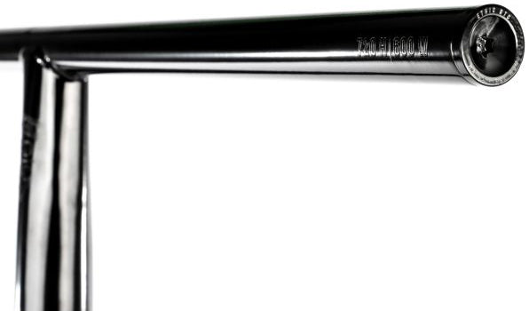 Close-up of a chrome Ethic handlebar featuring engraved text "TITAN 650 M" and a circular logo at the bar end, highlighting Ethic's craftsmanship in balance point modulation with their Handlebar Balance Point Modulation - 150g.