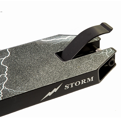 Close-up of the Revolution Storm Black Stunt Scooter Deck, showcasing its grey textured surface. It features a distinctive lightning bolt design alongside the "Revolution Storm" branding on the side. Perfect for park riders, this image highlights the rear section with a stylish black brake.
