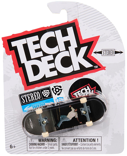 The Tech Deck 96mm M57 Fingerboard - Stereo set features a mini replica skateboard with a rider graphic, Stereo stickers, and is suitable for ages 6+.