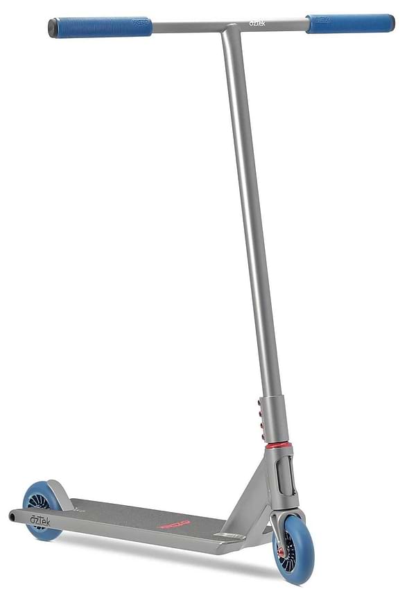 The Aztek Siren Complete Street Stunt Scooter in grey, featuring blue handle grips and wheels, a straight handlebar, and a minimalist deck design by Aztek, is displayed against a white background.