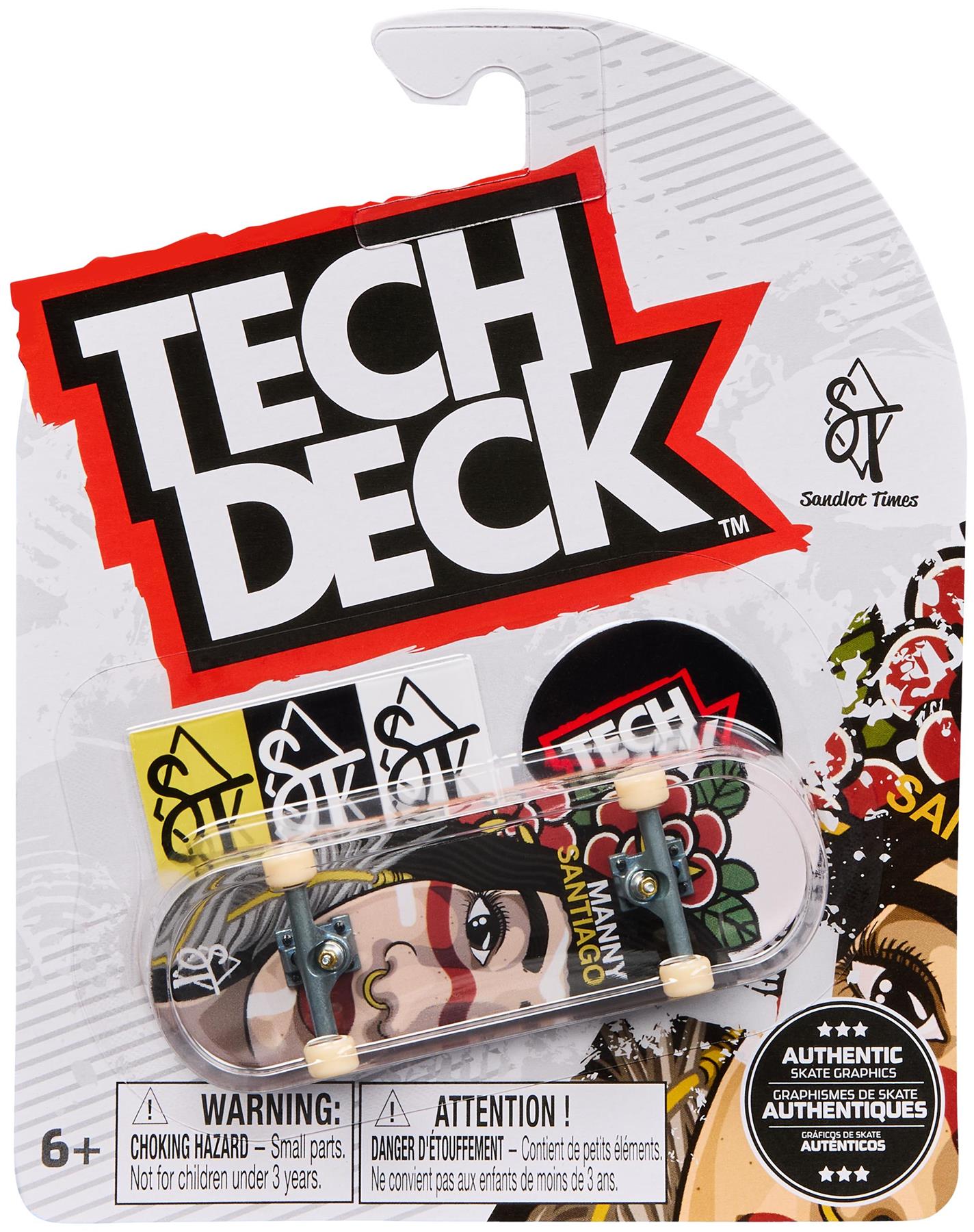 A Tech Deck 96mm M54 Fingerboard - Sandlot Times, in its packaging, displays bold “TECH DECK” branding, a cartoon face graphic with "Manny Santiago," authenticity labels, and safety warnings clearly on the front.