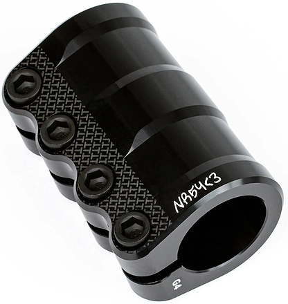 The Tilt Nikita LT 4 Bolt Standard SCS Stunt Scooter Clamp in black is lightweight, with four hex bolts, a knurled side texture, and "N54K<3" and "G4" engravings on the metal surface.