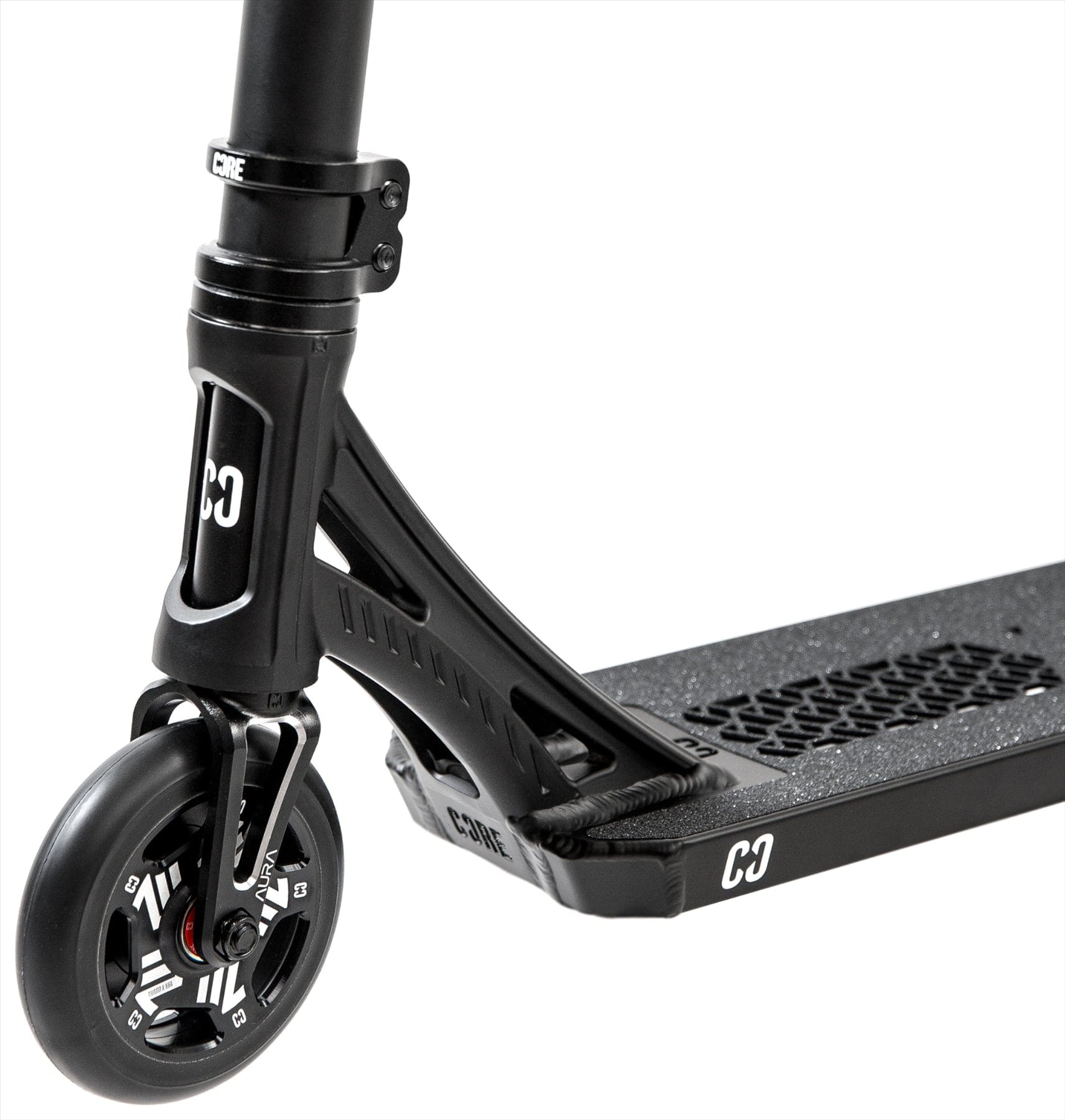 Close-up of the CORE SL3 Complete Stunt Scooter - Black, highlighting the wheel, fork, and deck with CORE branding and grip tape. This lightweight scooter by CORE boasts a sleek design ideal for skatepark sessions.