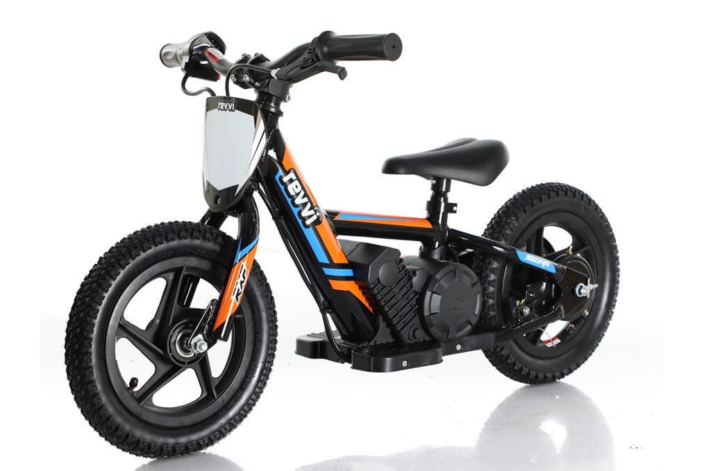 The Revvi 12" Kids Electric Balance Bike - Orange, from the brand Revvi, rests against a white background. This small bike showcases a minimalistic design with black and orange colors, complete with thick tires, simple frame, compact seat, and twist throttle for easy handling.