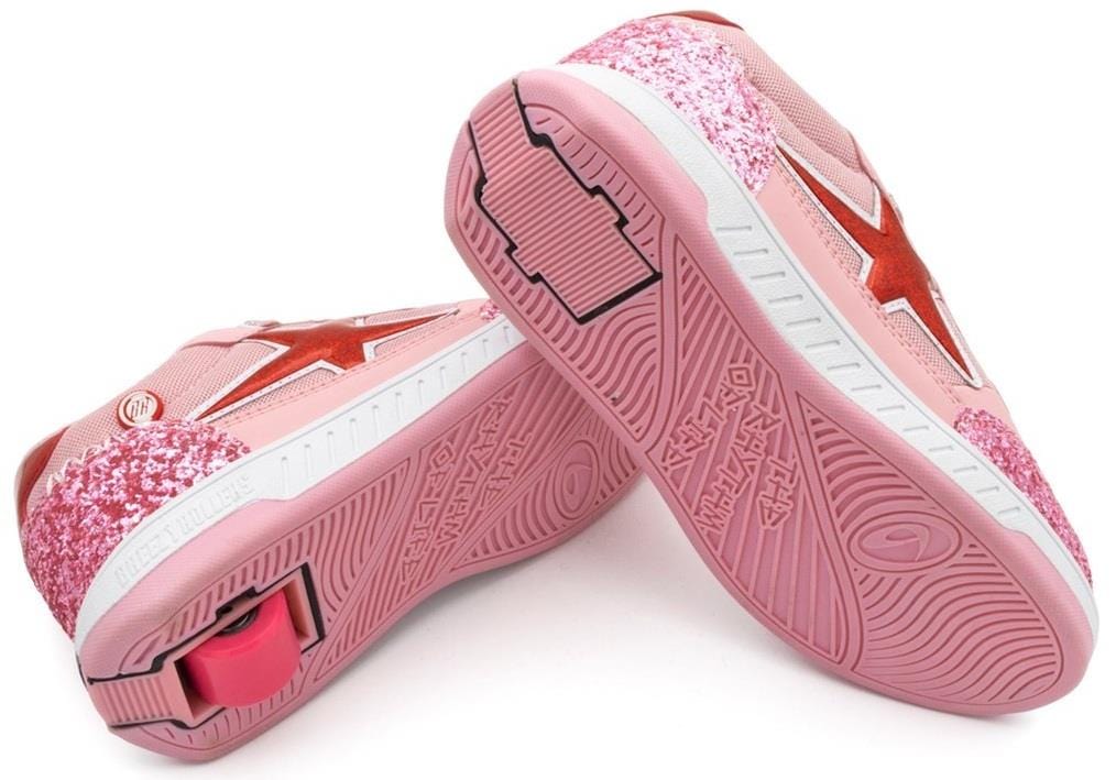 The Breezy Rollers Star Shoes - Pink by Breezy Rollers feature glitter accents, red star designs, and a patented heel wheel system—one wheel extended and one hidden—for stylish, innovative wheeled footwear.