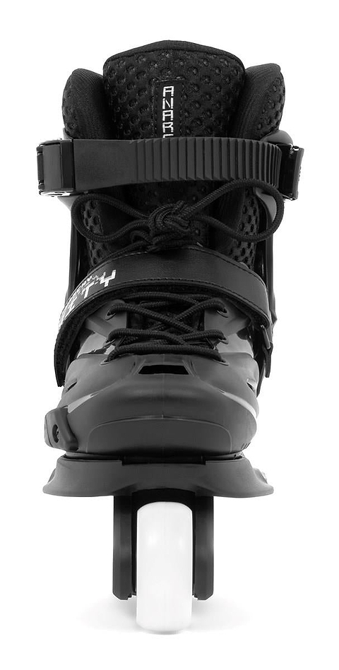 The Anarchy Unity Adjustable Aggressive Inline Skates - Black by Anarchy are junior skates with a front view, showcasing a visible white high rebound PU wheel, adjustable straps, and a ventilated padded upper for ankle support.