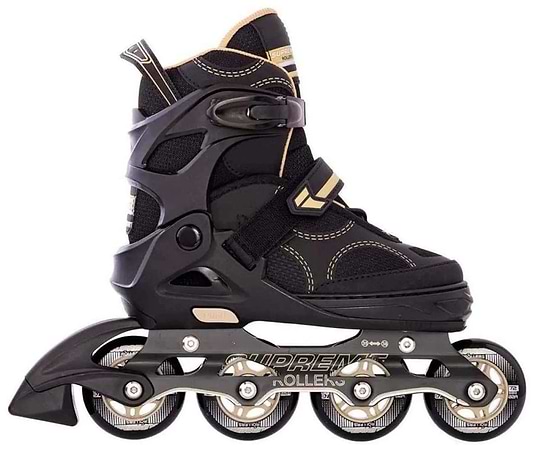The Supreme Venice Adjustable Kids Inline Skates in black and gold feature four wheels, a hard plastic frame, adjustable buckles, and breathable mesh fabric. Shown from the side on a white background. Adjustable sizing suits beginners.
