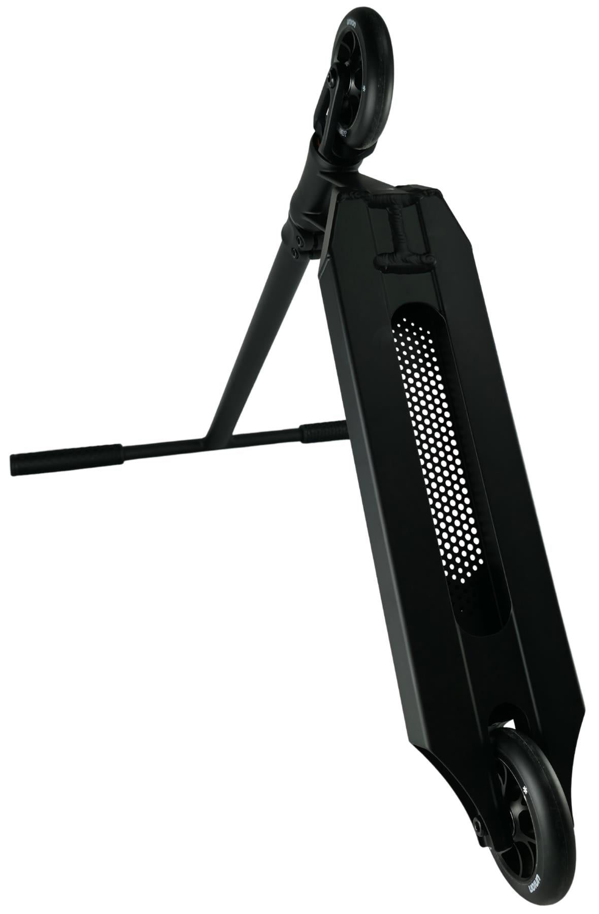 The Union Dot Complete Stunt Scooter by Union is shown in black, viewed from below at an angle, highlighting the perforated deck and visible front and rear wheels against a white background.