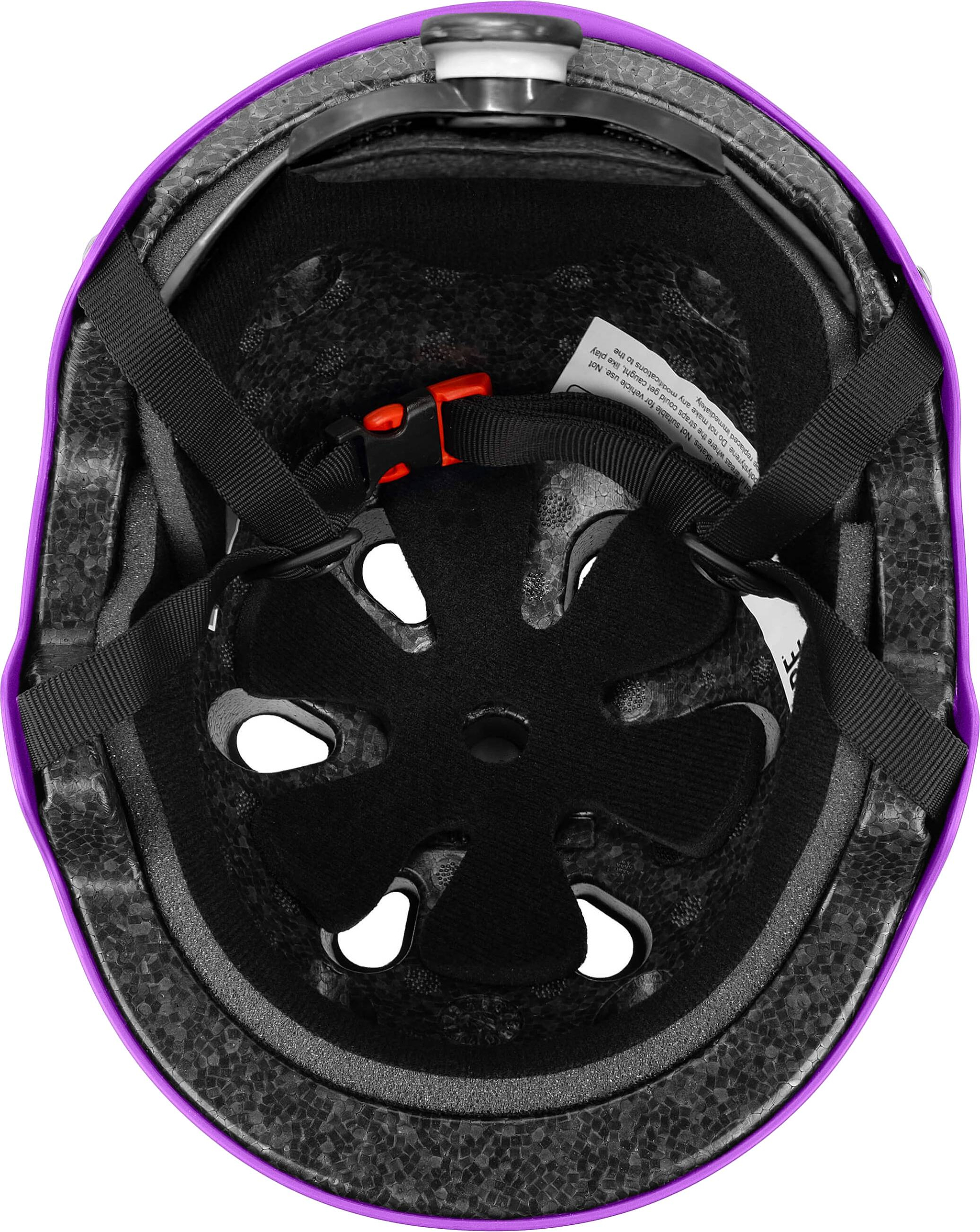 The inside view of the CORE Action Sports Skate / Scooter Helmet in purple, highlighting its foam padding, ventilation holes, black straps, and red buckle.