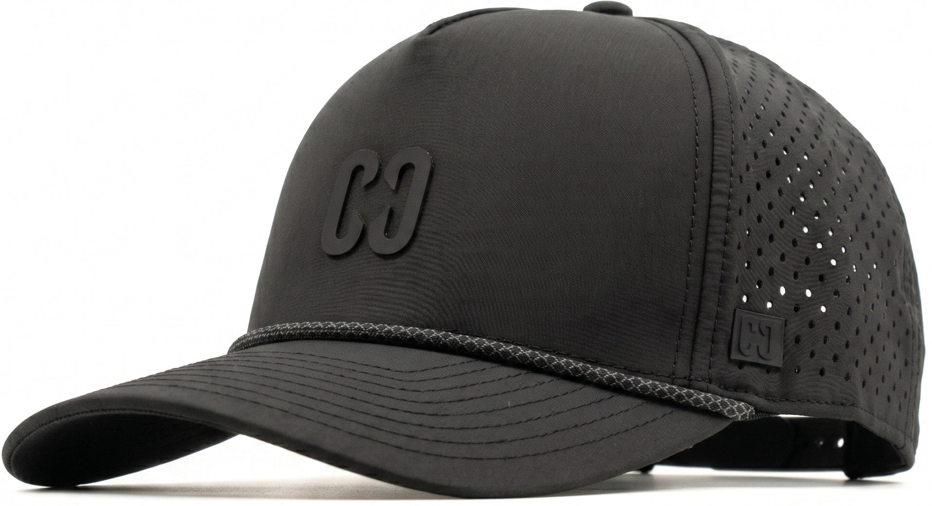 Introducing the CORE Aero Rope Cap – Black by CORE: This performance cap features a curved brim, breathable mesh back, and a raised “GO” CORE logo on the front. With decorative stitching above the brim, it offers a stylish blend of classic design and everyday functionality.