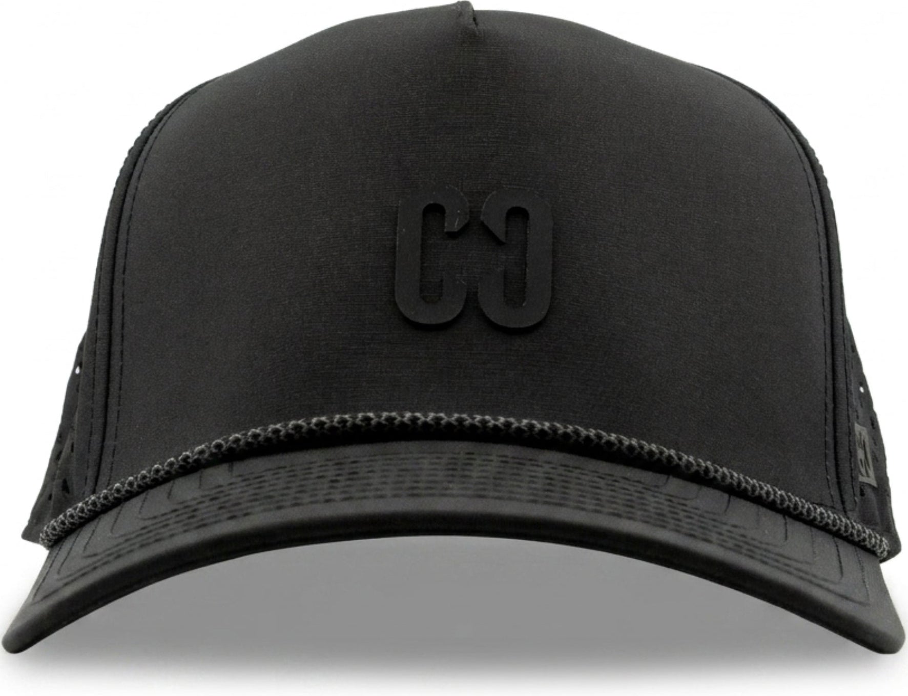 The CORE Aero Rope Cap - Black is a performance cap featuring a rounded bill, mesh back, and a raised black “CG” logo on the front. Decorative stitching accents the brim.