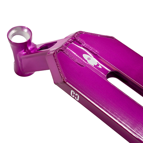 Close-up of the CORE Apollo Purple Stunt Scooter Deck - 5" by CORE, featuring a metallic purple finish, center cutout, visible welds, durable design, and a white "C3" logo near the edge.