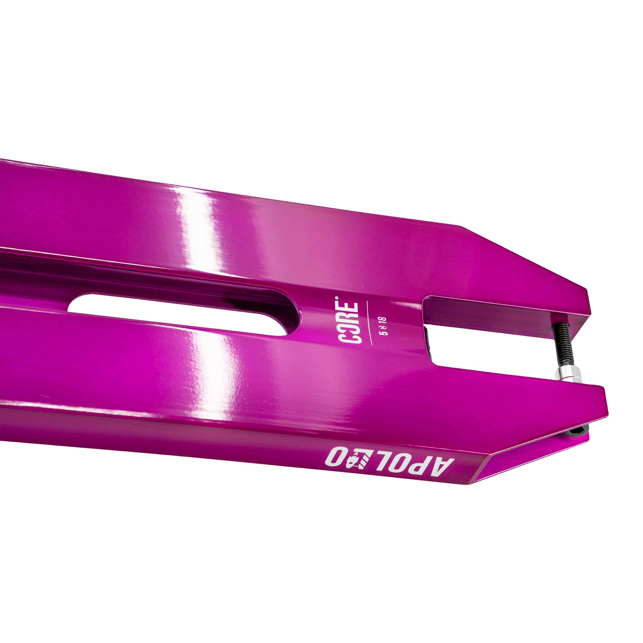 Close-up of the CORE Apollo Purple Stunt Scooter Deck - 5" by CORE in metallic purple with "CORE" and "APOLLO" in white, featuring a rectangular cutout and a visible rear axle bolt.