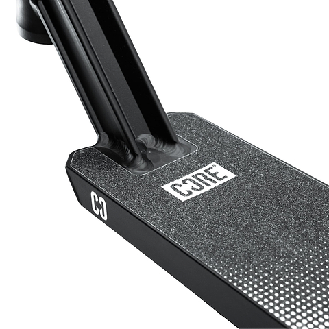 Close-up of the CORE CD1 Black / Chrome Stunt Scooter Deck by CORE, measuring 4.5″ x 19″. This lightweight aluminium deck features a textured grip surface and bold white “CORE” branding. Securely connected to the scooter’s neck, it’s an ideal choice for beginner riders looking for both style and durability.