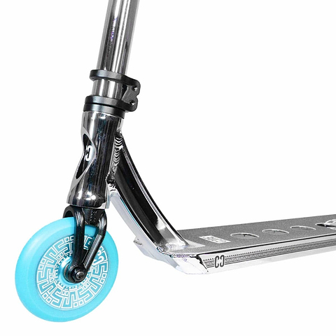 Close-up of the front section of a chrome and teal stunt scooter, showcasing a metallic finish with a patterned design on its CORE CL1 blue wheels, enhanced by premium aftermarket components.