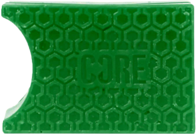 Rectangular apple green CORE Epic Skate Wax with a honeycomb texture and a semi-circular cutout on one side.