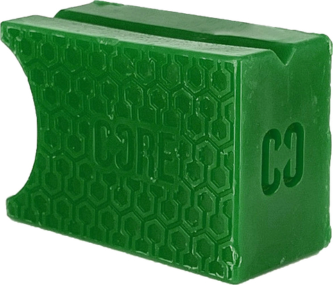Apple green CORE Epic Skate Wax block in a rectangular shape with a honeycomb pattern and a curved cutout on one side.
