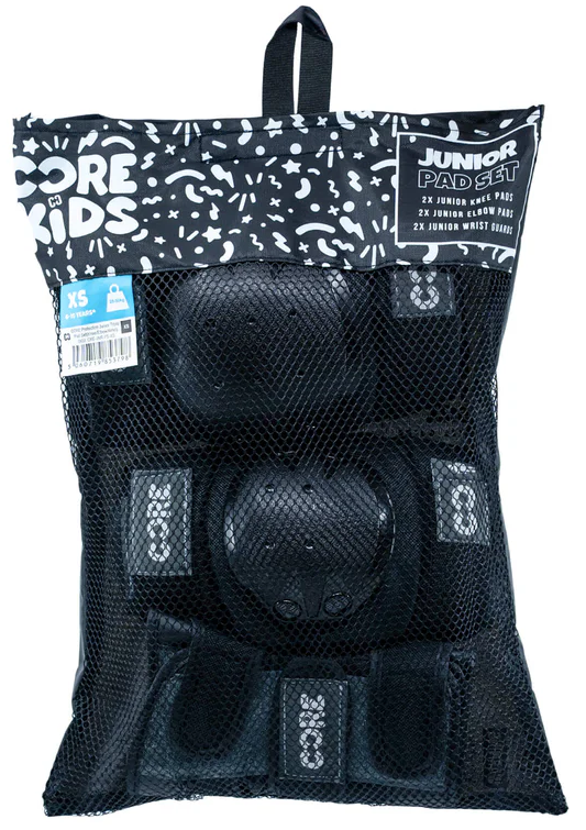 The CORE Junior Triple Skate Protection Pad Set - Black/Grey by CORE includes two knee pads, two elbow pads, and two wrist guards in size XS. All are visible through the black mesh bag labeled with the product name for skatepark safety.